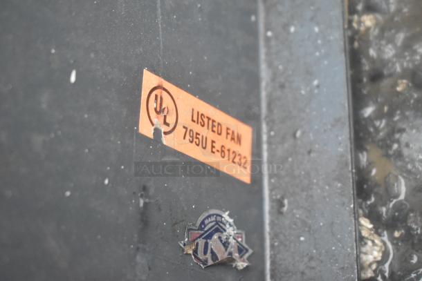 Berner Air Curtain with UL listed fan label, model 795U E-61232, and "Made in USA" marking visible, in used condition.