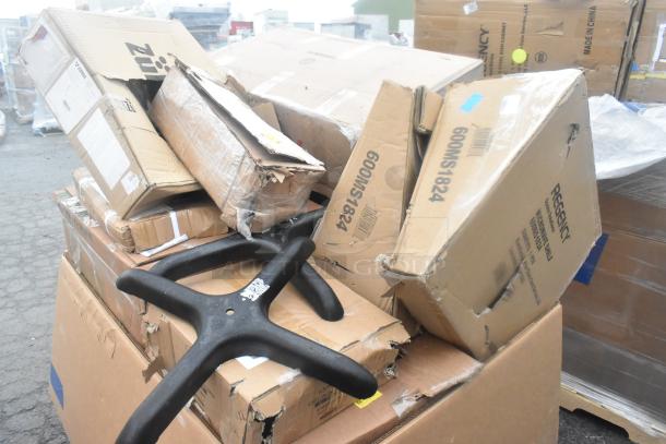 Boxes of brand new scratch and dent items including microwave shelves and table base pieces. Some boxes are visibly damaged.