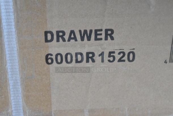 Cardboard box labeled "DRAWER 600DR1520," indicating one of 12 new scratch-and-dent items including tables and racks.