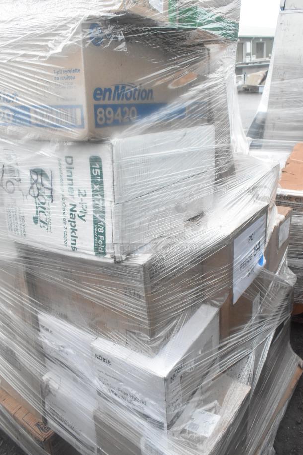 Pallet with 27 new scratch and dent items including enMotion napkins and Noble gloves, wrapped in plastic.