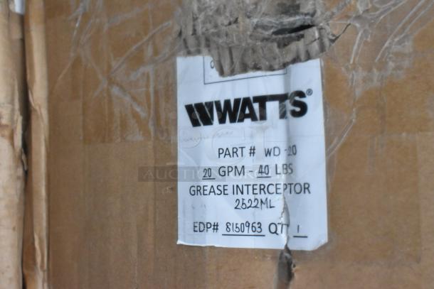 Cardboard box with label showing "WATTS" grease interceptor, part # WD-20, 20 GPM, 40 lbs, EDP# 8150963, scratch and dent condition.