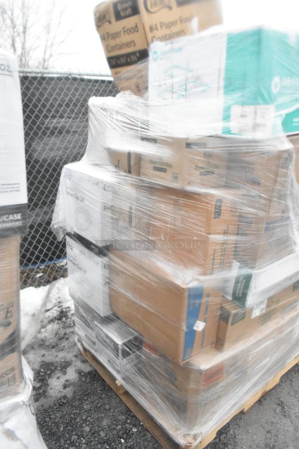 Pallet with 28 new scratch and dent items, including boxed towels and portion cups, labeled and wrapped in plastic.