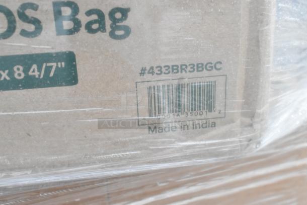 Cardboard box showing "#433BR3BGC," barcode, "Made in India" label. Box contains scratch and dent items like towels.