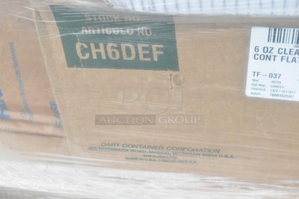 Cardboard box labeled "CH6DEF," contains 6 oz clear portion cups, batch 7000452597. Part of 28-item scratch and dent auction lot.