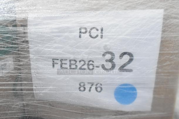 Plastic-wrapped package labeled "PCI FEB26-32 876" with a blue dot, containing 28 scratch and dent items.