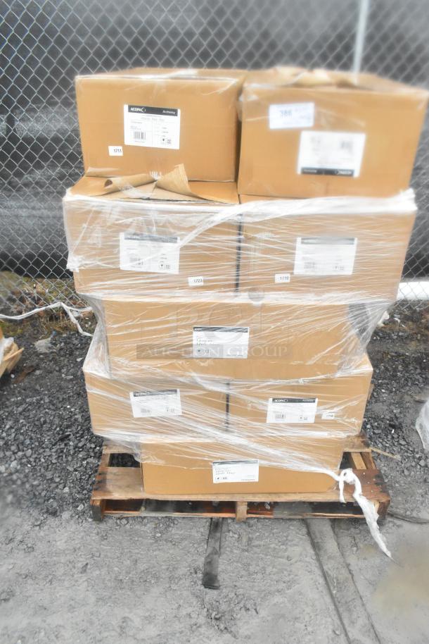 Pallet of 14 new scratch and dent items, including mugs, in labeled boxes, wrapped in clear plastic wrap.