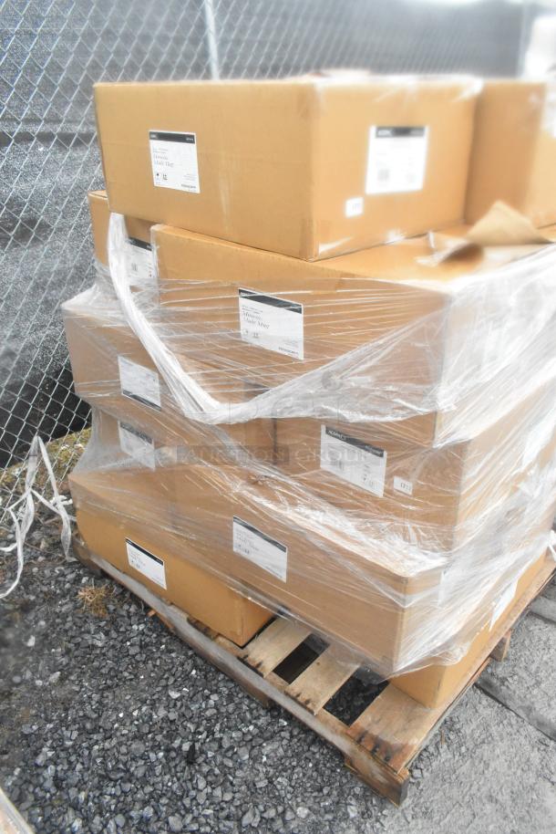 Stack of boxes on a pallet, wrapped in plastic, labeled "Moscow Mule Mug." Contains 14 scratch and dent items.