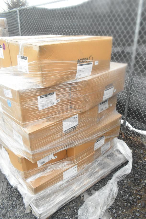 Stack of Acopa boxes, wrapped in plastic, labeled "scratch and dent," containing 14 brand new mule mugs.