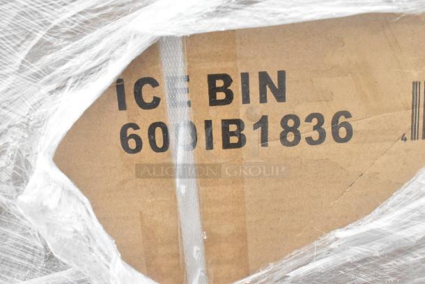 Cardboard box labeled "ICE BIN 60IB1836," encased in plastic wrap, part of a scratch-and-dent auction lot.