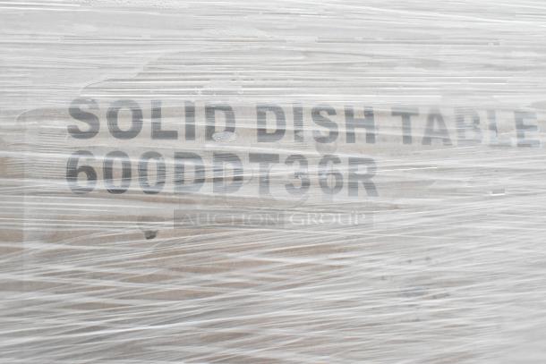 Plastic-wrapped item labeled "Solid Dish Table 600DDT36R," part of 7 scratch and dent items, including an ice bin.