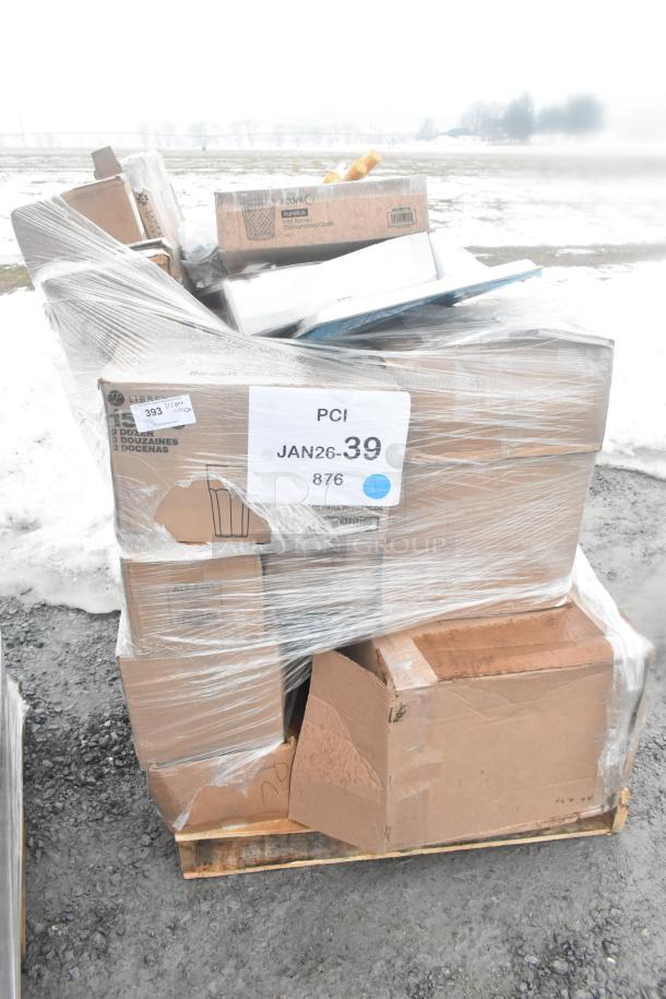 Pallet with 20 scratch and dent items, including dolly, sieve, paper cutter, glasses. Boxes labeled "Libbey," wrapped in plastic.