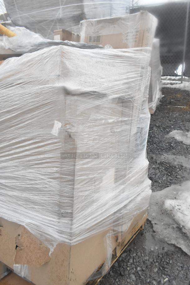 Shrink-wrapped pallet of 20 new items including dolly, sieve, and paper cutter. Visible cardboard damage. Auction lot.