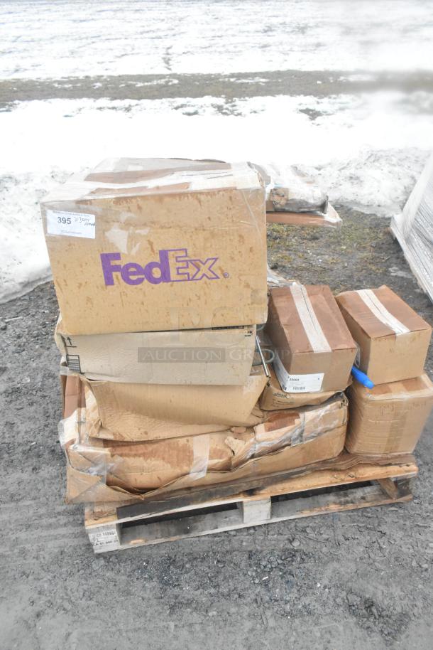 Stack of 16 brand new scratch and dent boxes on a pallet. Includes steam table pans and slicer attachment. FedEx and shipping labels visible.