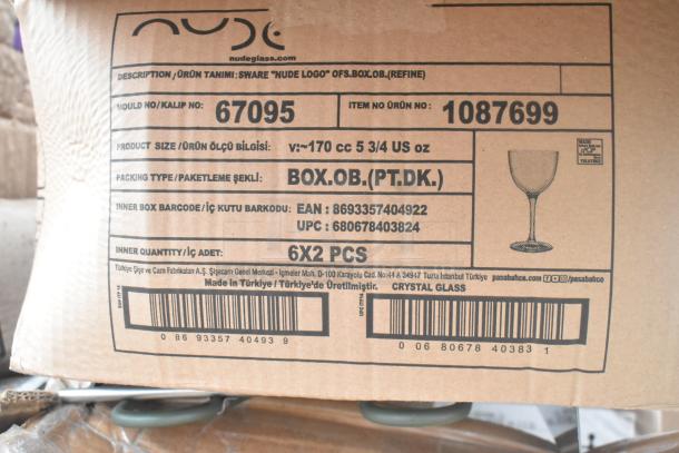 Cardboard box label showing Nude Glass brand, model 67095, and product details for crystal glassware, made in Turkey.