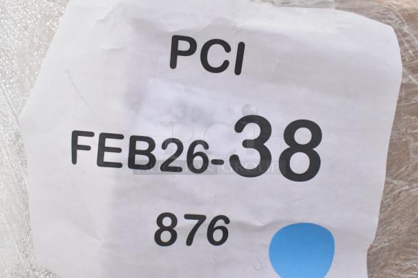 Label on auction item, reading "PCI FEB26-38 876" with a blue dot, indicating a lot of 27 new scratch and dent items.