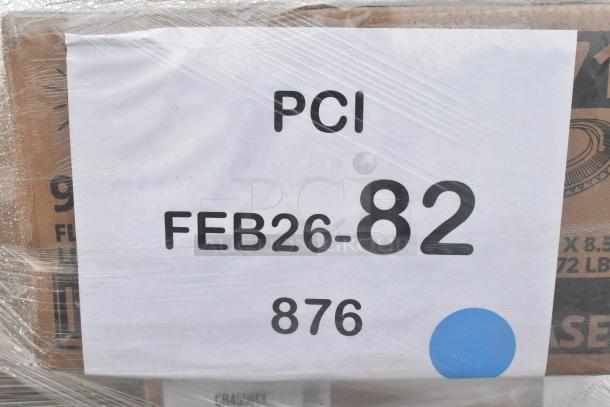Package labeled "PCI FEB26-82 876" in plastic wrap, containing new scratch and dent items like hot cups and spoons.