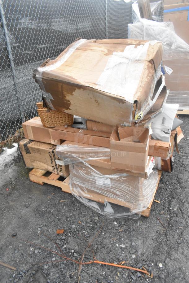 Pallet with 13 scratch and dent items, including casters and handles. Boxes are taped and wrapped in plastic, some wear visible.