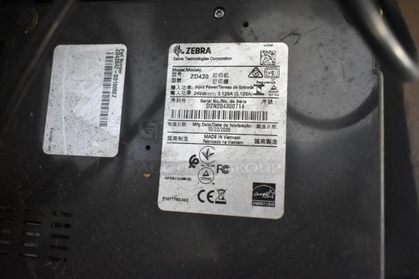 Zebra ZD420 label with model, serial number D2N204300714, 24Vdc input, 3.125A, and Energy Star certification, made in Vietnam.