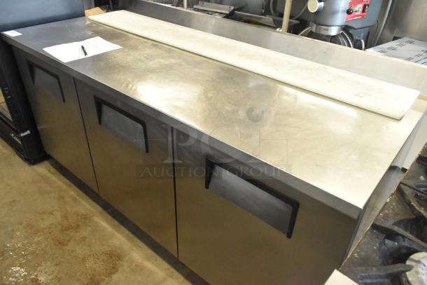True TWT-72 Commercial 3 Door Work Top Cooler on casters, stainless steel, 115 volts, 1 phase, excellent condition.