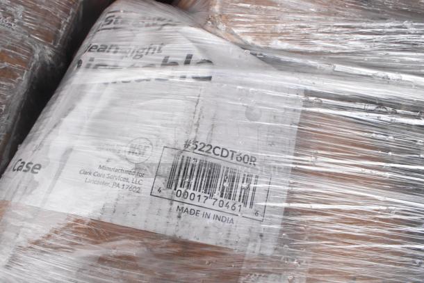 Pallet wrapped in plastic showing barcode #522CDT60R, labeled "Made in India," manufactured for Clark Core Services, LLC.
