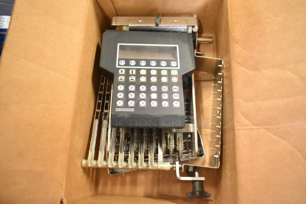 Bizerba Commercial Countertop Meat Slicer Stacker in box with parts, 115 volts, 1 phase, features control panel.