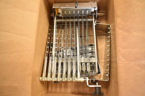 Bizerba commercial countertop meat slicer stacker, includes box of parts, 115 volts, 1 phase, good condition.