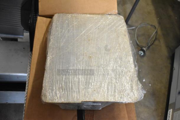 Bizerba Commercial Countertop Meat Slicer Stacker, wrapped, with box of parts. 115 volts, 1 phase.