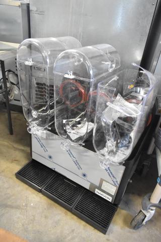 Brand new Narvon 378RBD5G3 triple 5-gallon refrigerated beverage dispenser. Scratch and dent condition, 115 volts, 1 phase.