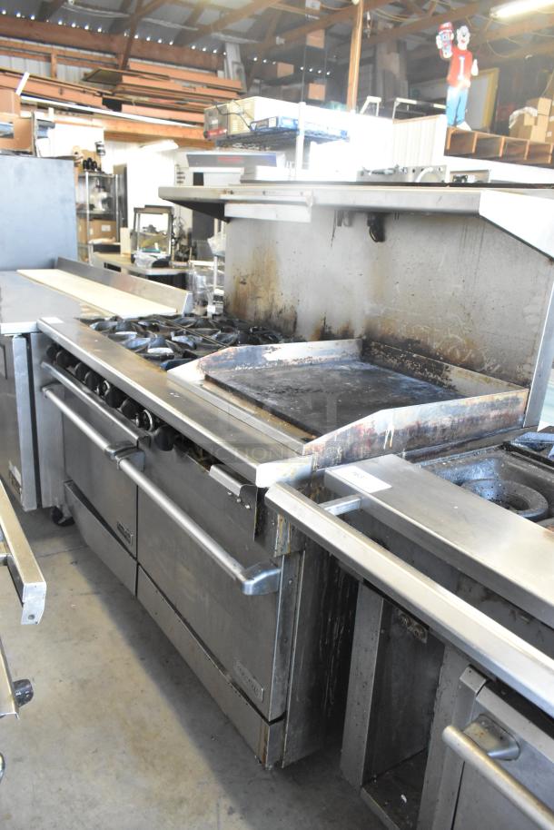 ThermaTek commercial gas 6-burner range with flat top griddle and dual ovens. Stainless steel, used condition.