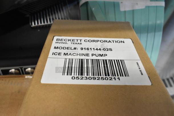 Beckett Corporation ice machine pump, model 9161144-02S. New condition, 208-230V. Label with barcode visible.