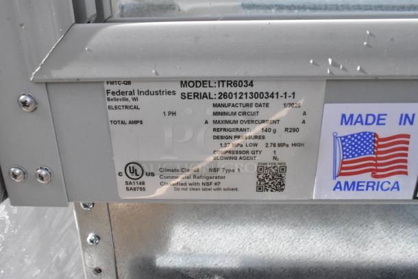 Label of Federal Industries ITR6034 bakery display case showing model, serial number, specs, and "Made in America" sticker.