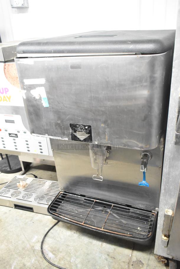 Cornelius ED150 commercial countertop ice dispenser, stainless steel, 115 volts, 1 phase, slight wear, "Push for Ice" label.