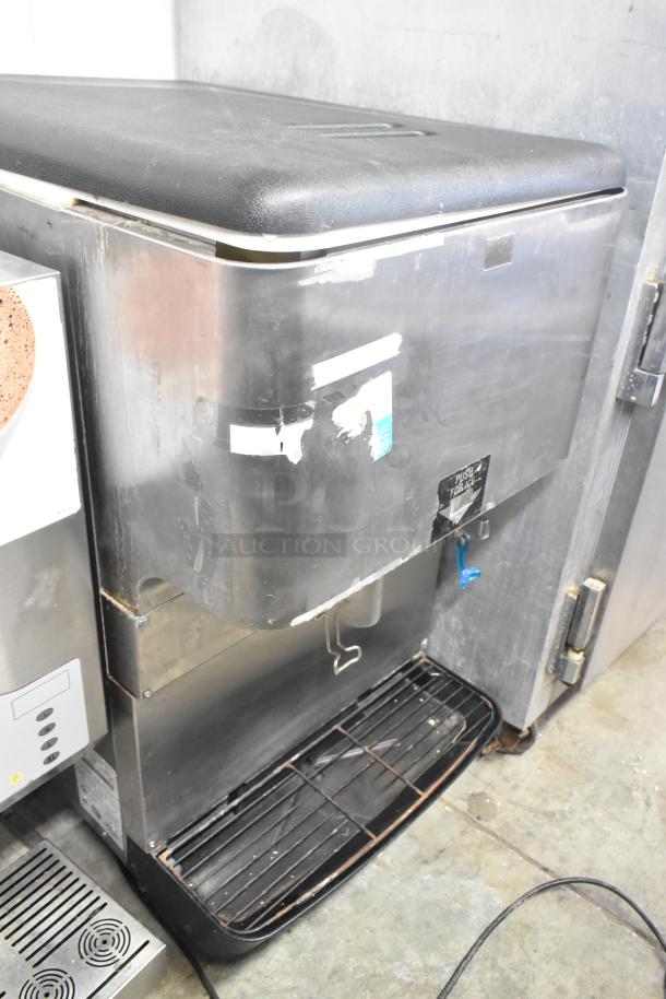 Cornelius ED150 Commercial Ice Dispenser, countertop model, 115V, 1 phase. Used condition; visible wear and labels.