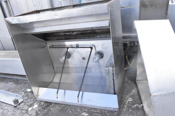 5' commercial grease hood with lights; stainless steel; used; shows wear; suitable for restaurant kitchens.