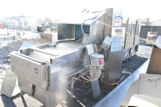 Hobart FT900 commercial flight type dishwasher, 480V, 3-phase, stainless steel, industrial condition with visible control panel.