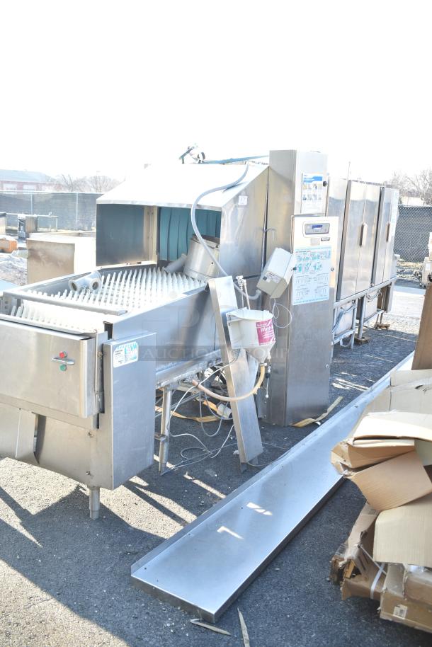 Hobart FT900 commercial floor-style flight type dishwasher, 480 volts, 3 phase, with visible controls and labels, used condition.