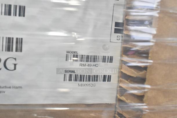 Hoshizaki RM-49-HC commercial cooler label, showing model and serial number M00952G. New scratch and dent condition.