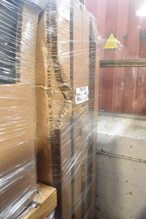 Brand new 2024 Hoshizaki F1A-FS commercial freezer in original packaging, featuring visible scratches and dents. Model label visible.