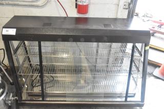 Brand new Avantco 177HDC48 48" countertop heated display case, 3 shelves, sliding doors, minor scratches, 115 volts.