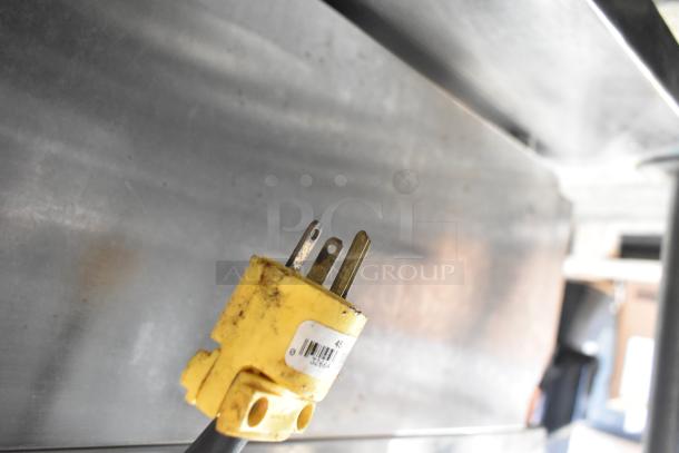 Yellow power plug for a commercial countertop electric panini press, showing a 208V, 1-phase configuration.