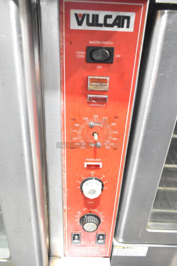 Vulcan SG4D4 commercial convection oven controls, featuring thermostatic dials and power level settings in used condition.