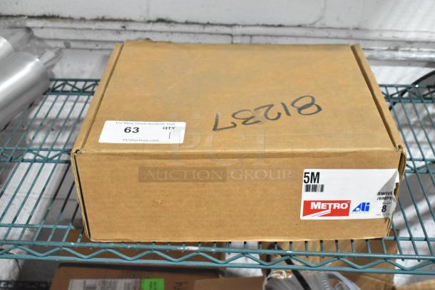 Box of 4 brand new Metro 5M 5" plated swivel stem casters, labeled as scratch and dent. Box shows slight wear.