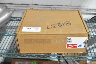 Box of 4 brand new Metro 5M 5" plated swivel stem casters, labeled as scratch and dent. Box shows slight wear.