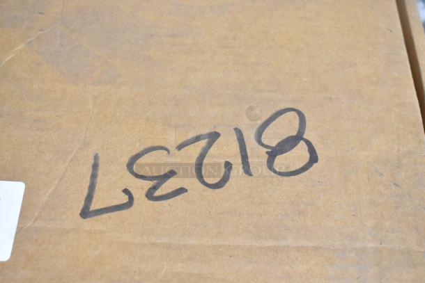 Lot of 4 Metro 5M 5" plated swivel stem casters, brand new, noted as scratch and dent. Box marked with "LE218".