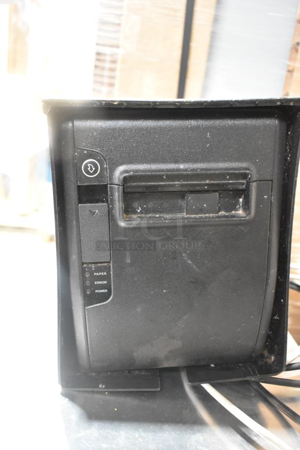 Bixolon SRP-S300 receipt printer, black, functioning condition, power and error indicators visible, slight surface wear.