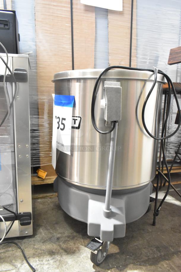 Brand new Hobart SDPS-11 salad dryer, 20-gallon capacity, electric stainless steel, minor scratches and dents, on casters.