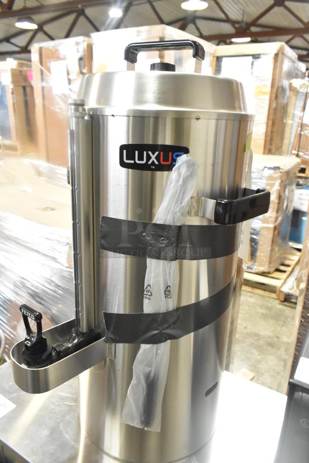 Brand new Scratch and Dent Fetco TPD-30 344TPD30 Luxus 3 Gallon Coffee Dispenser, stainless steel, with Fetco spigot.