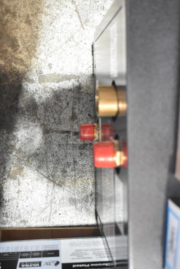 Brand new Hatco C-15 Compact Booster Water Heater, 240V, 3 phase. Scratch and dent condition. Brass and red fittings visible.