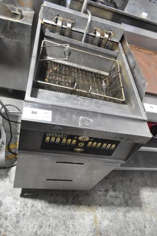 Hobart commercial deep fat fryer with digital controls, dual baskets, and signs of use. Model label visible.