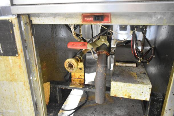 Hobart commercial deep fat fryer showing interior wiring and components. Features power switch; some rust and wear visible.